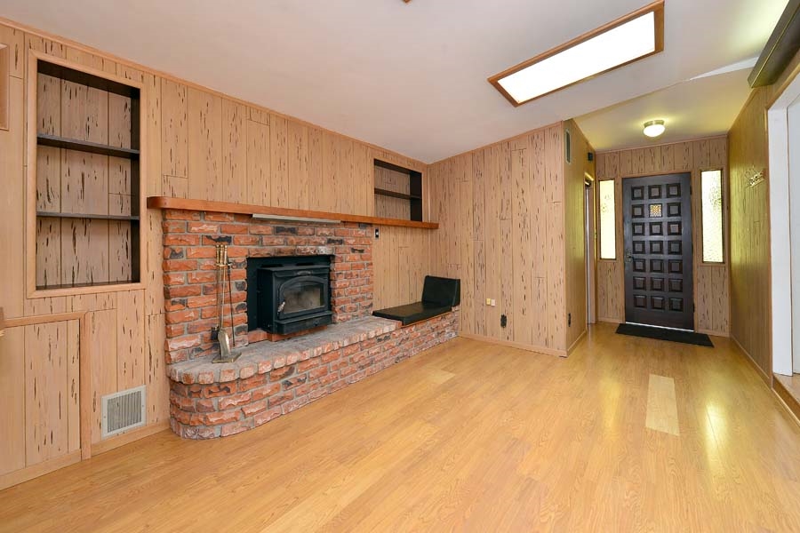 11319 Posthill Road Lakeside, CA 92040 - Photo 4 of 25 Warm up near the fireplace or enjoy time with family or friends around it.