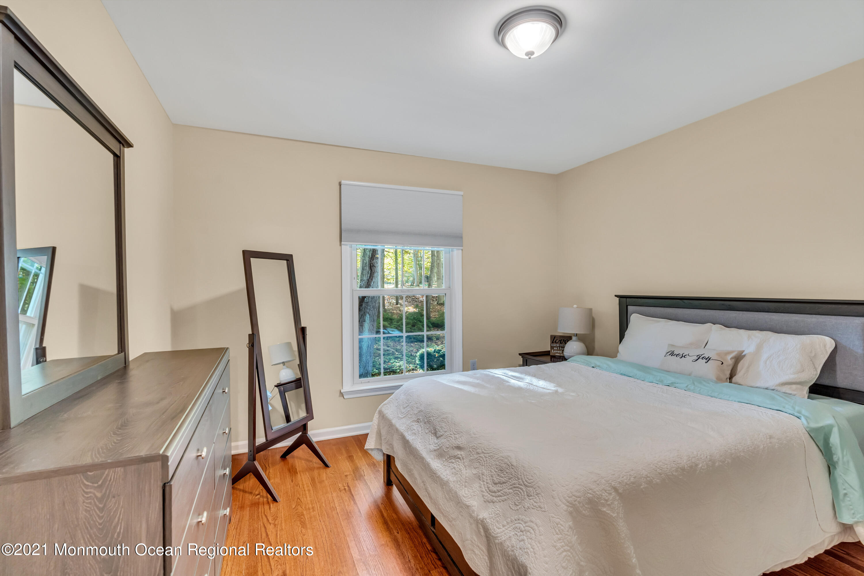36 Glenwood Road Colts Neck, NJ 07722 - Photo 14 of 23 a bedroom with a bed and a large window