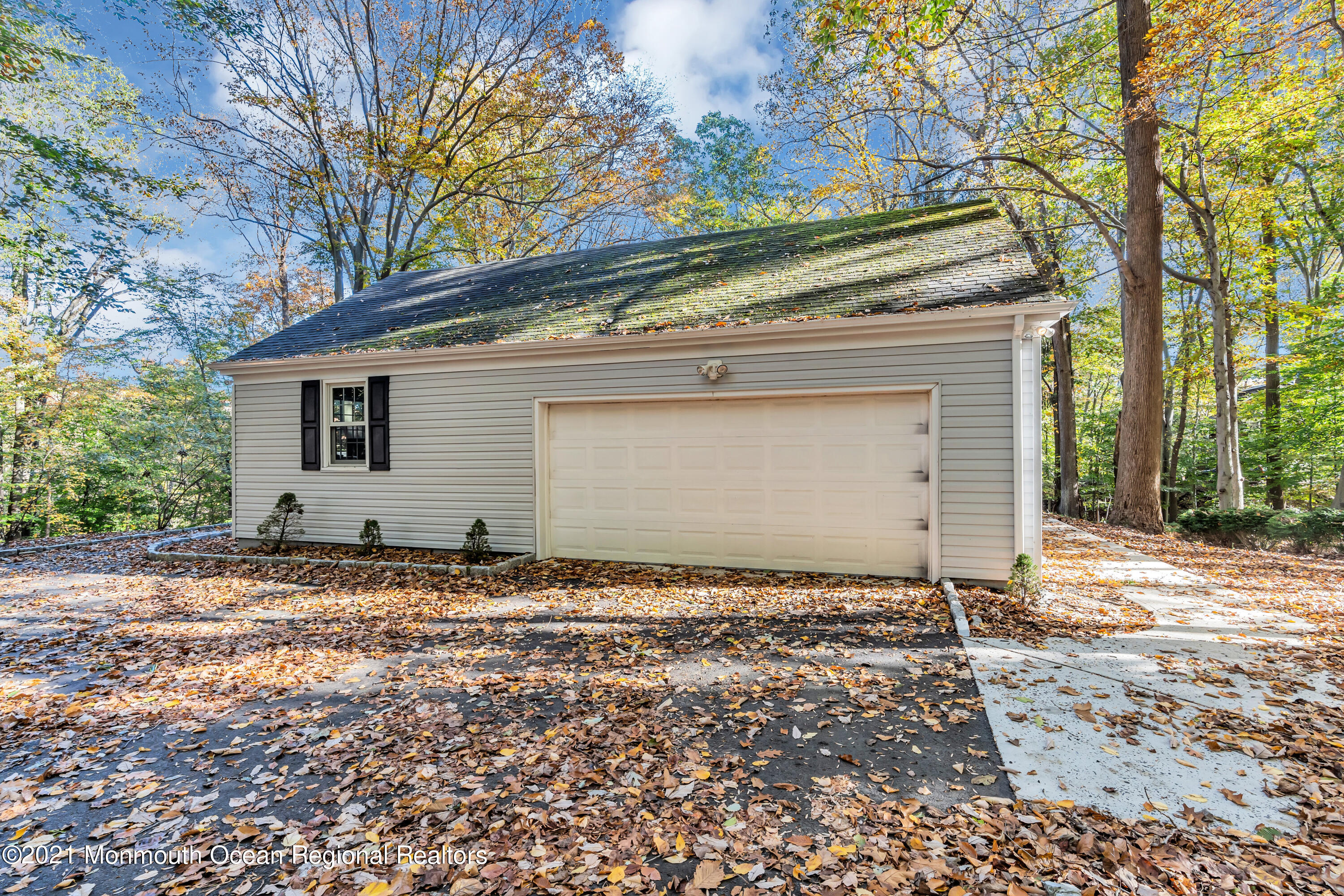 36 Glenwood Road Colts Neck, NJ 07722 - Photo 22 of 23 a view of a house with a yard