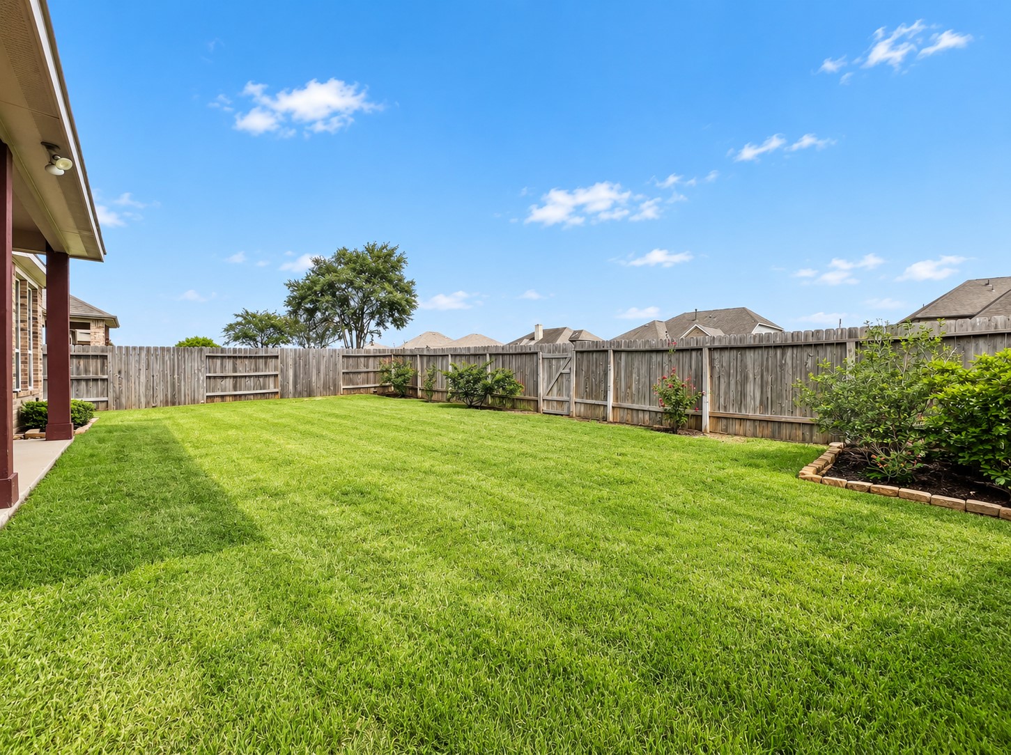 20306 Windsor Field Spring, TX 77379 - Photo 31 of 37 Vast backyard area with a covered patio and no back neighbors