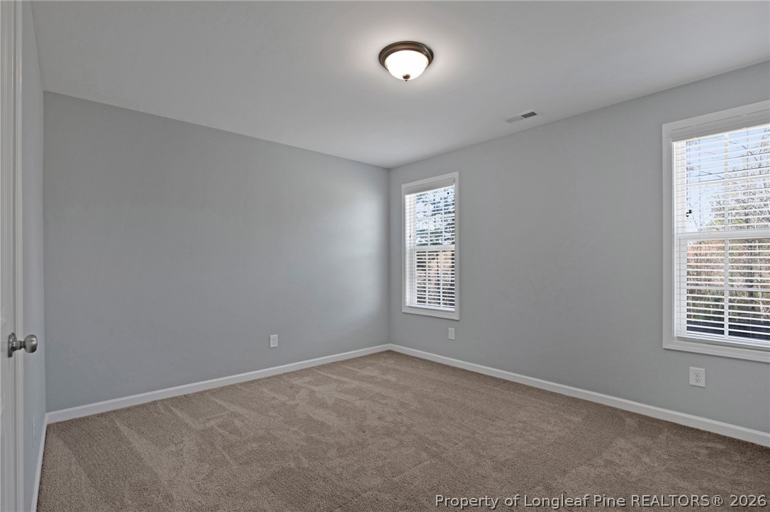 258 Fieldbrook Street Raeford, NC 28376 - Photo 21 of 40 a view of an empty room with a window