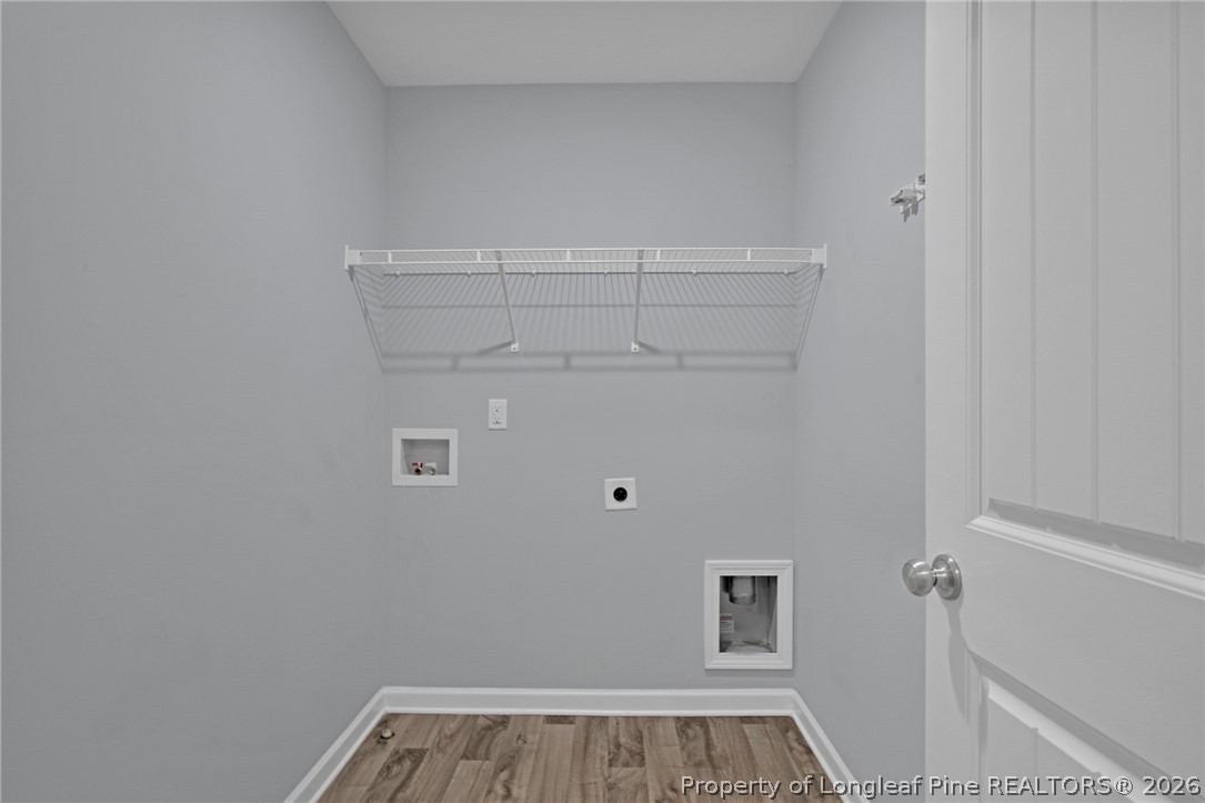 258 Fieldbrook Street Raeford, NC 28376 - Photo 26 of 40 a view of a room with racks on the wall