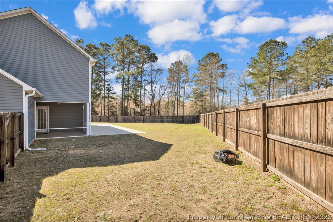 258 Fieldbrook Street Raeford, NC 28376 - Photo 36 of 40 a view of a backyard with large trees