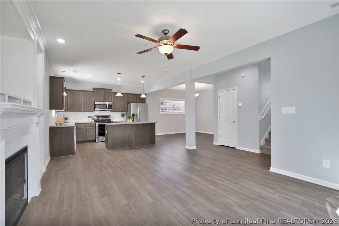 258 Fieldbrook Street Raeford, NC 28376 - Photo 9 of 40 a view of kitchen with kitchen island stainless steel appliances sink and cabinets