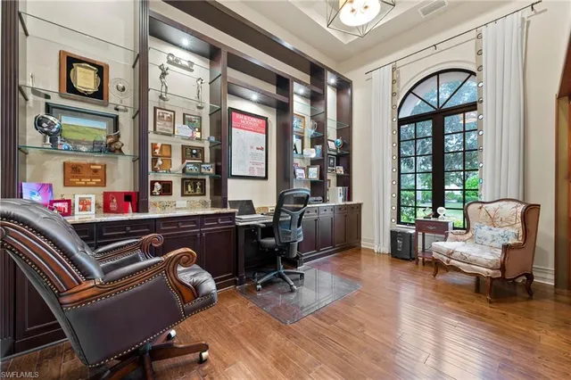 a spacious bedroom with a large bed and a couch