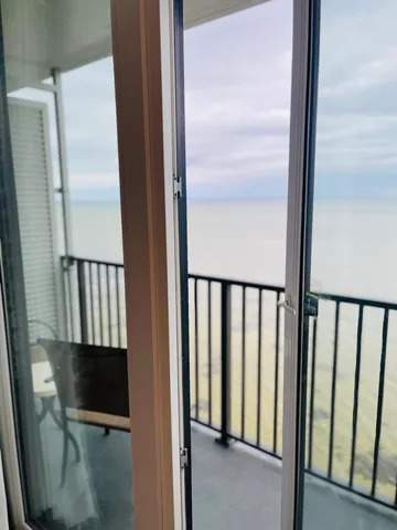 a close view of wooden floor with a sink