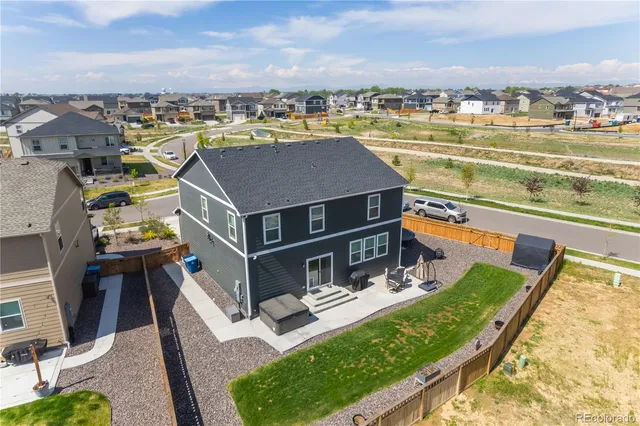 a view of a city with lawn chairs