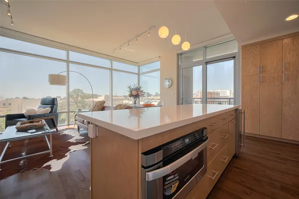 a kitchen with a stove and a sink