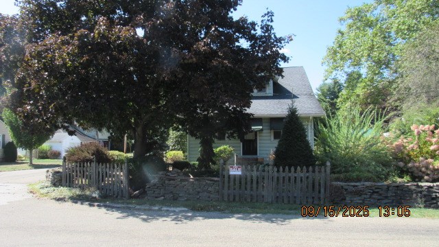1201 Conewango Avenue Warren, PA 16365 - Photo 6 of 49 a front view of a house with a garden