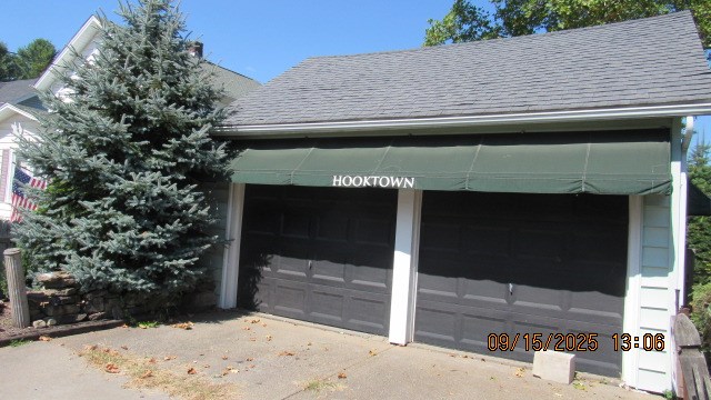 1201 Conewango Avenue Warren, PA 16365 - Photo 9 of 49 a view of a wooden door and a tree in the background