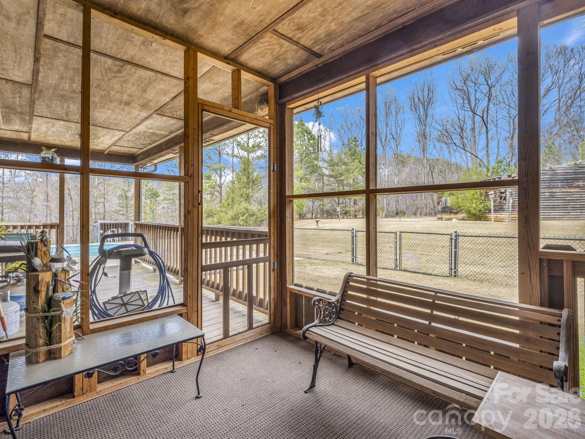 308 Frog Hollow Road Rutherfordton, NC 28139 - Photo 6 of 26 a bedroom with furniture and large windows