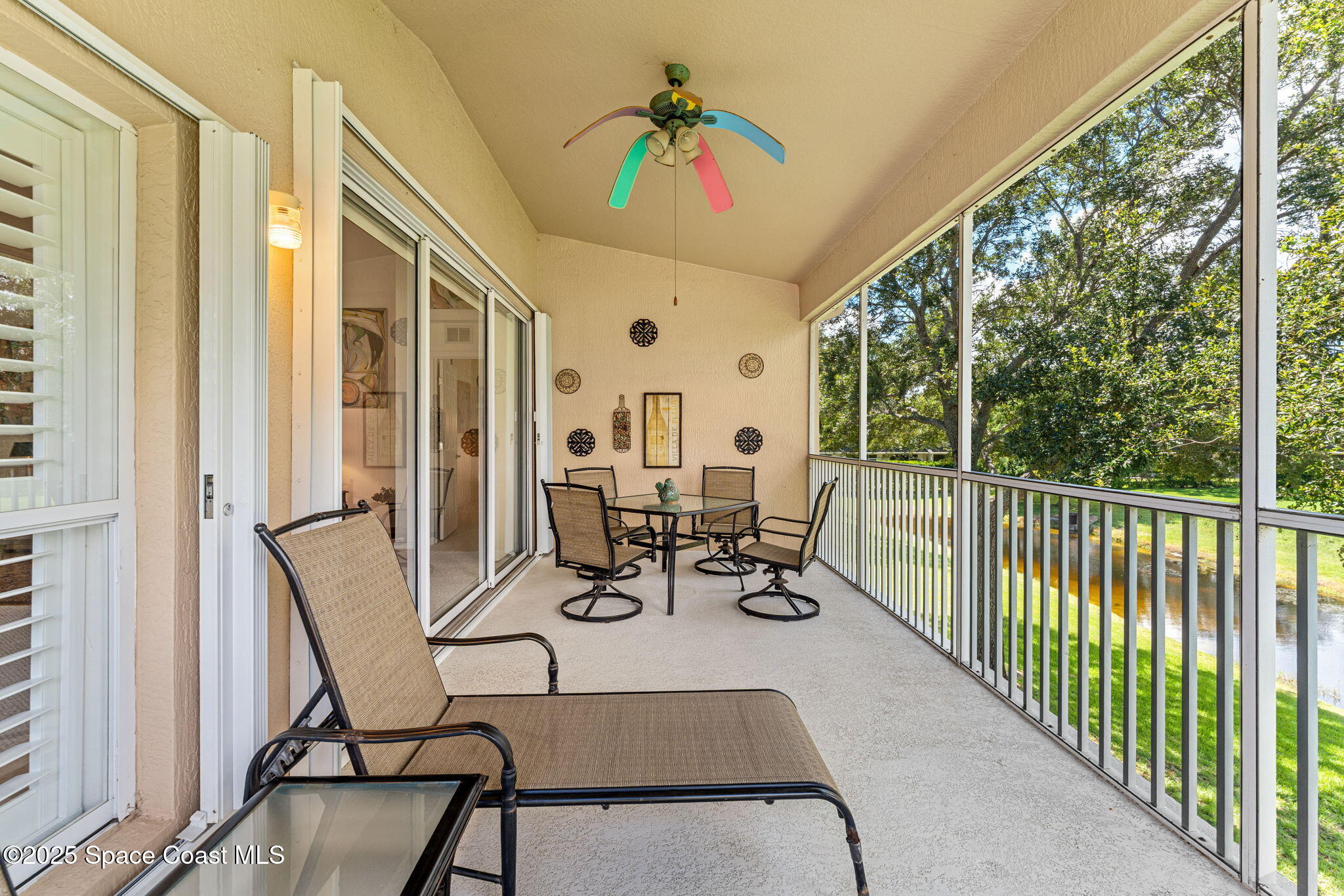 400 Trotter Lane, Unit 204 Melbourne, FL 32940 - Photo 23 of 38 a view of two chairs in the balcony