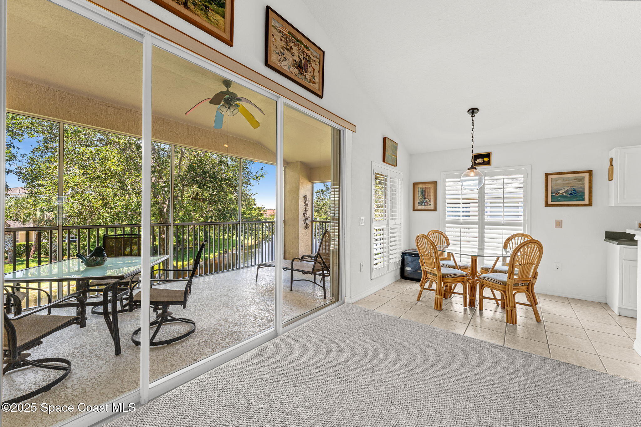 400 Trotter Lane, Unit 204 Melbourne, FL 32940 - Photo 5 of 38 a view of a dining room with furniture window and outside view