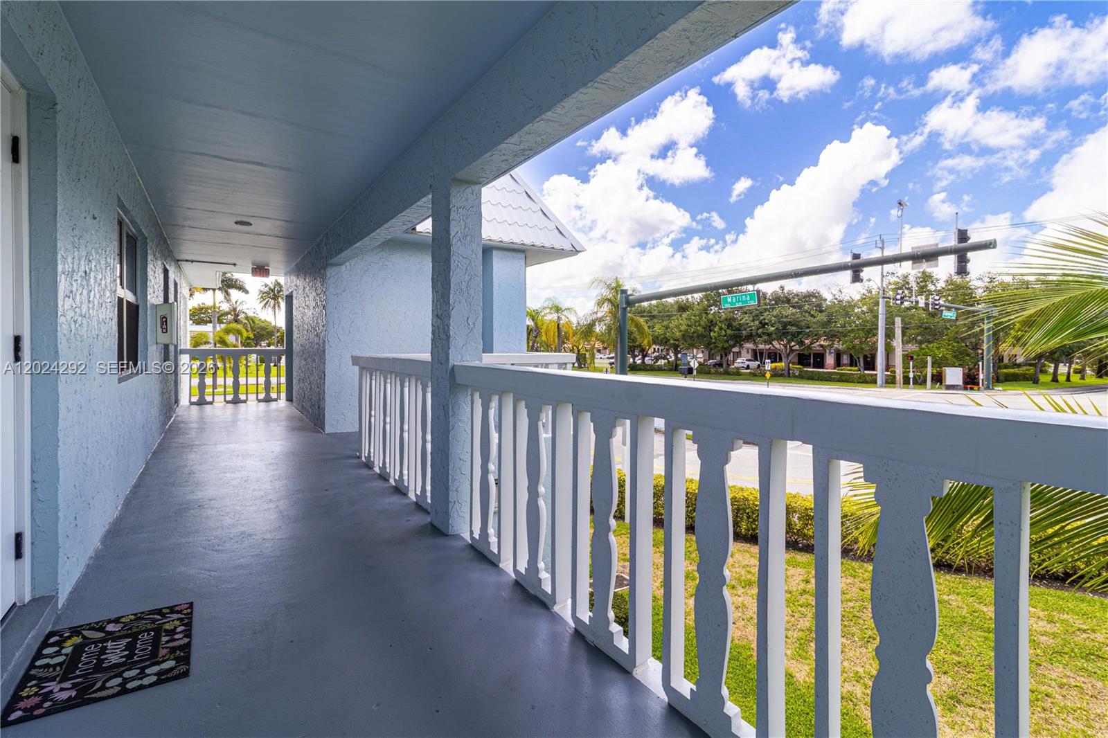 9780 Marina Boulevard, Unit 424 Boca Raton, FL 33428 - Photo 4 of 32 a view of a porch