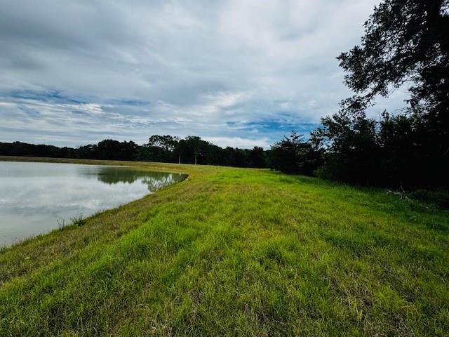 123 Fcr 1000 Road Wortham, TX 76693 - Photo 14 of 18 a view of a lake with houses in the back