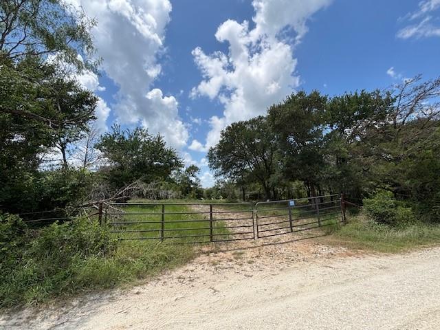 123 Fcr 1000 Road Wortham, TX 76693 - Photo 7 of 18 a backyard of a house with lots of green space