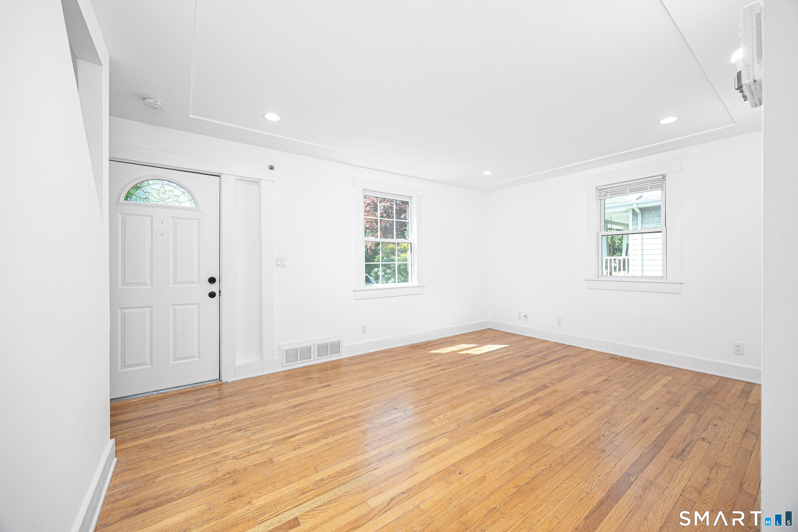 18 Cook Road Stamford, CT 06902 - Photo 6 of 36 Entrance brings you directly into living room.