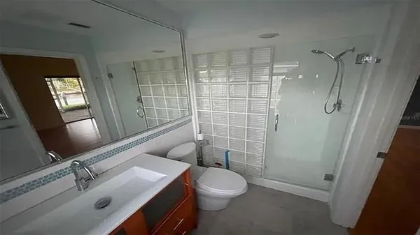 a view of a livingroom with wooden floor