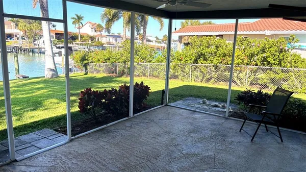 a view of a glass door and a window