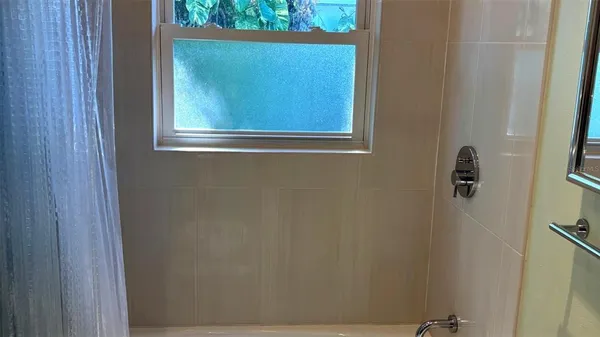 a view of a balcony with chairs