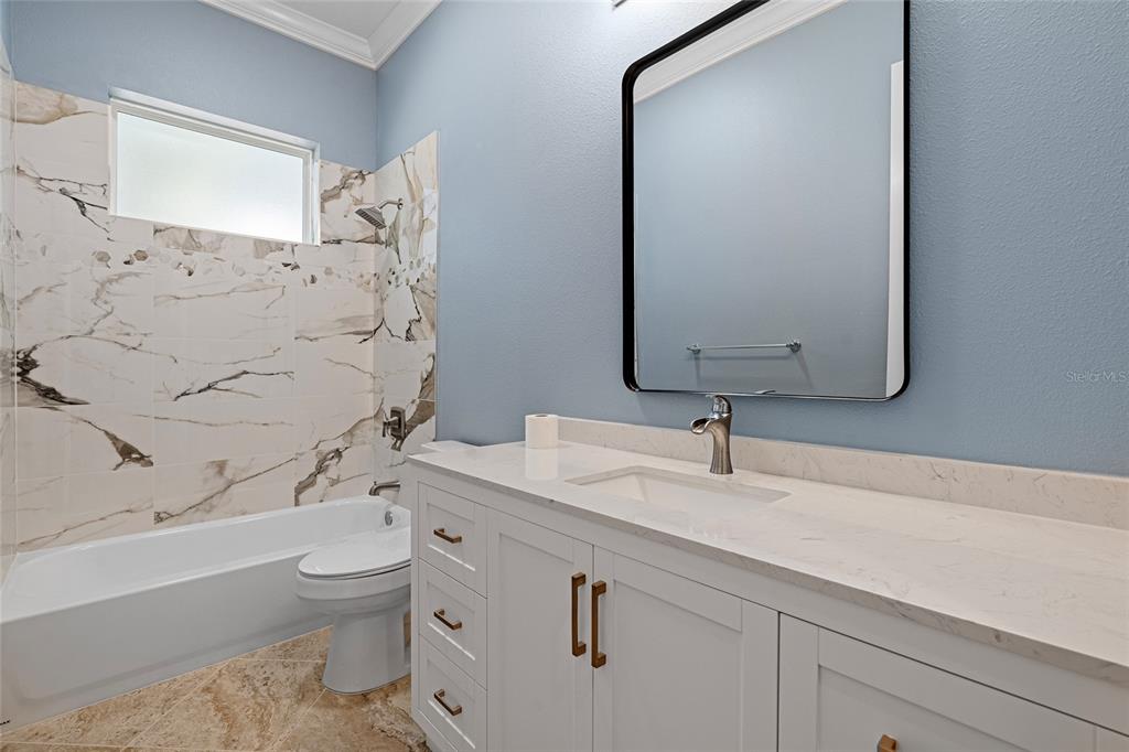 3183 East Fawn Court Inverness, FL 34452 - Photo 14 of 33 a bathroom with a sink toilet and shower