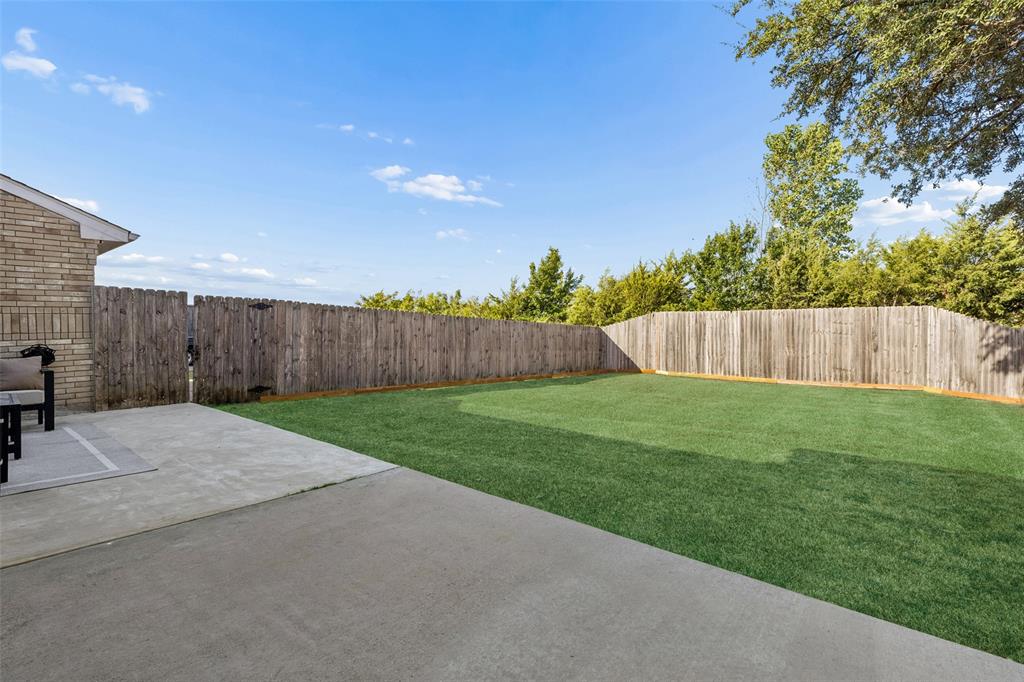 5709 Highgate Lane Rowlett, TX 75088 - Photo 22 of 27 grass has been virtually enhanced