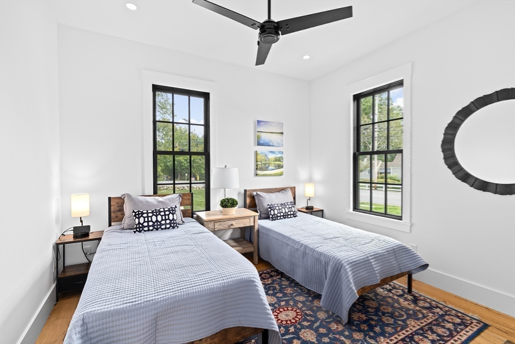 42 Captain Peirce Road Scituate, MA 02066 - Photo 14 of 40 a bedroom with bed and a window