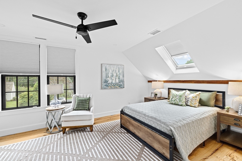 42 Captain Peirce Road Scituate, MA 02066 - Photo 20 of 40 a bedroom with a bed wooden floor and window