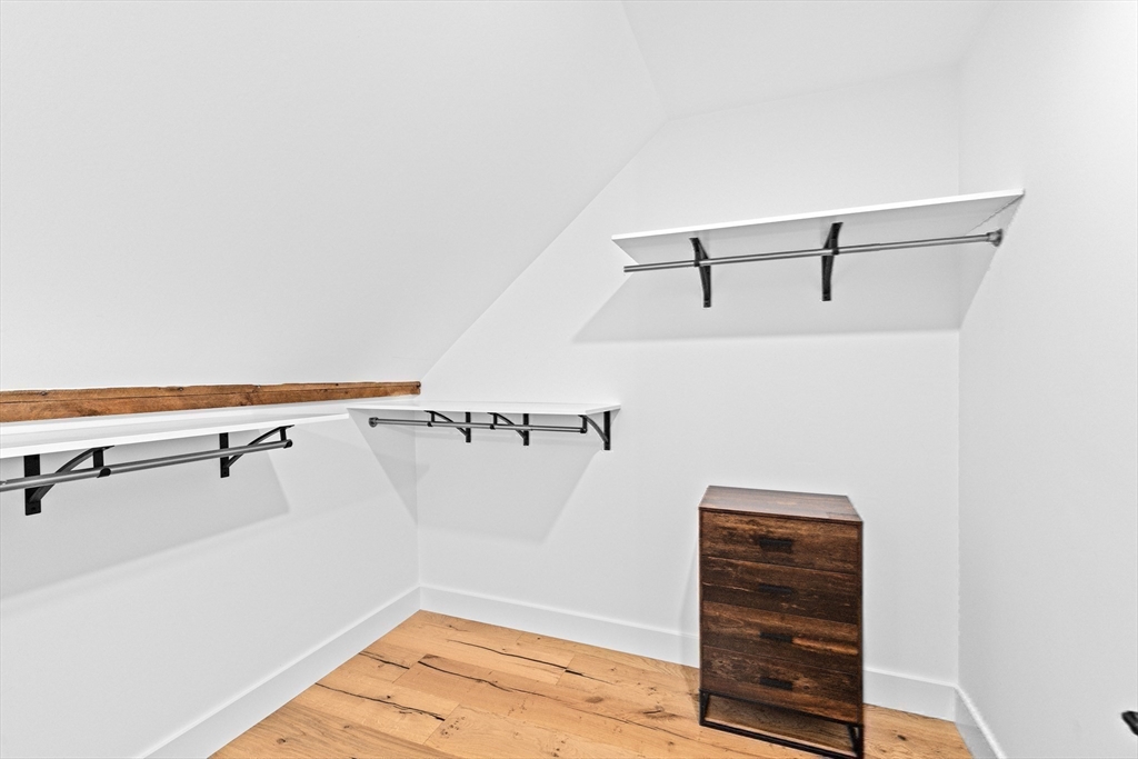 42 Captain Peirce Road Scituate, MA 02066 - Photo 22 of 40 a view of walk in closet with empty racks