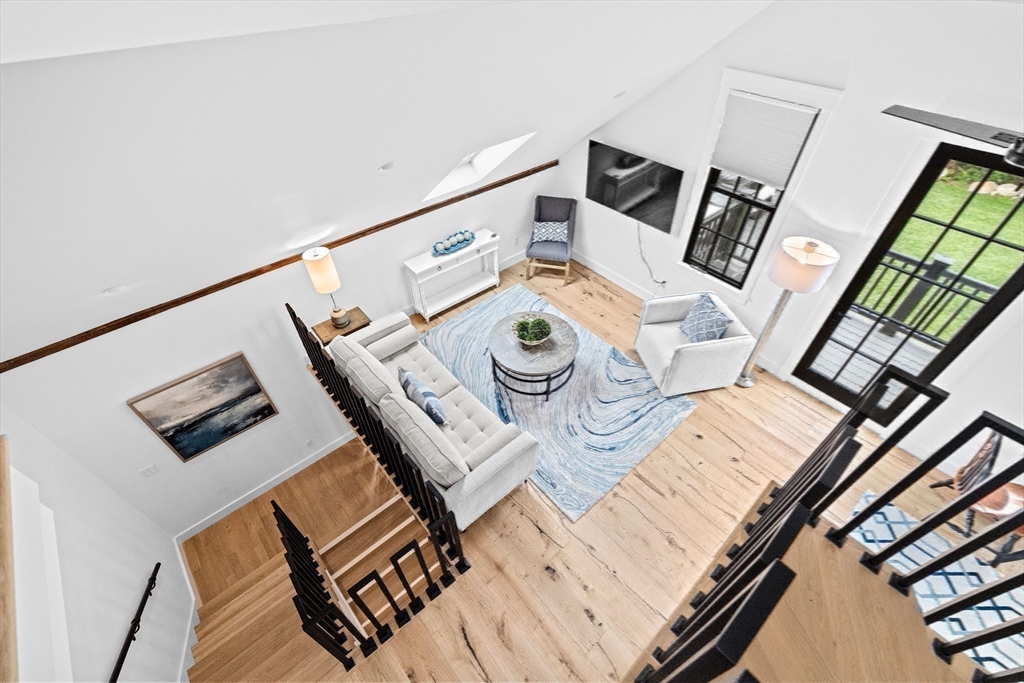 42 Captain Peirce Road Scituate, MA 02066 - Photo 28 of 40 a view of a living room with furniture and wooden floor