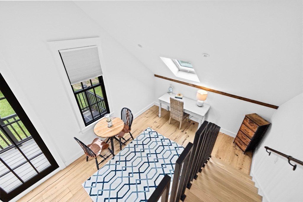 42 Captain Peirce Road Scituate, MA 02066 - Photo 29 of 40 a view of a dining room with furniture and wooden floor