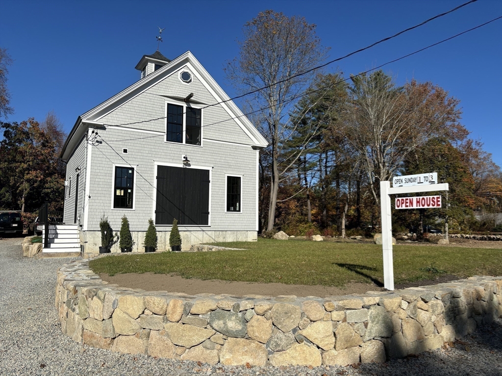 42 Captain Peirce Road Scituate, MA 02066 - Photo 33 of 40 a front view of a house with a yard