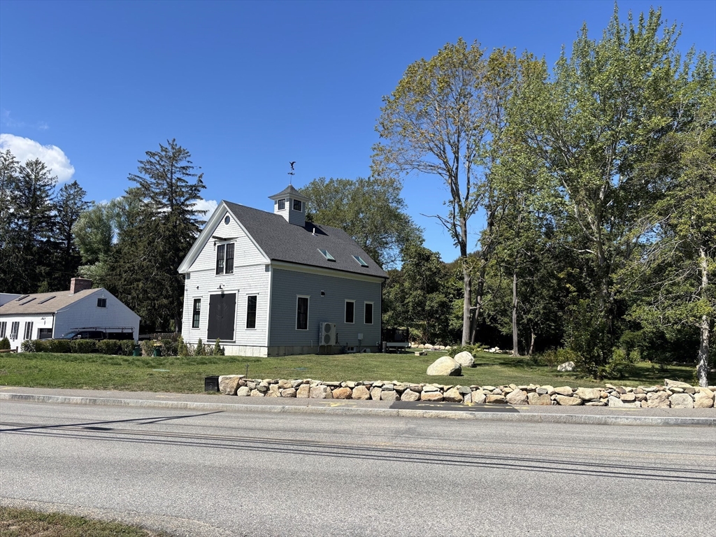 42 Captain Peirce Road Scituate, MA 02066 - Photo 34 of 40 a view of a white house with a sink and yard tree
