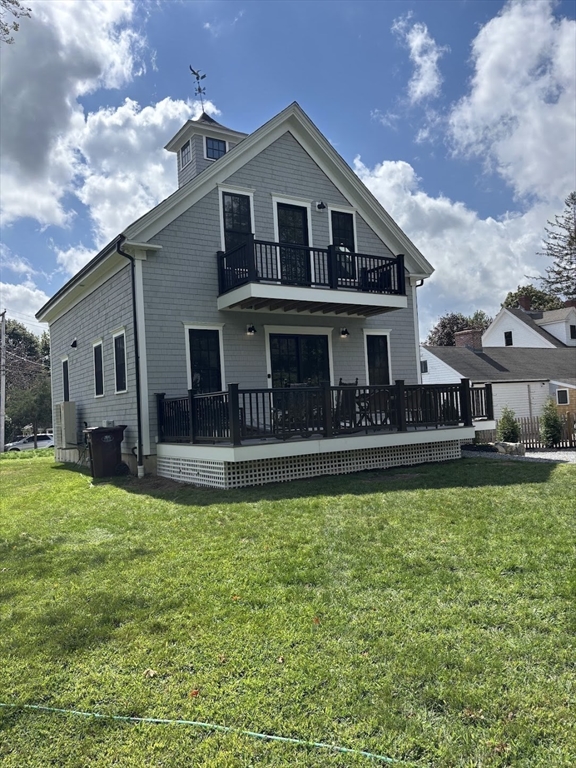 42 Captain Peirce Road Scituate, MA 02066 - Photo 35 of 40 a view of a house with a big yard potted plants and large tree