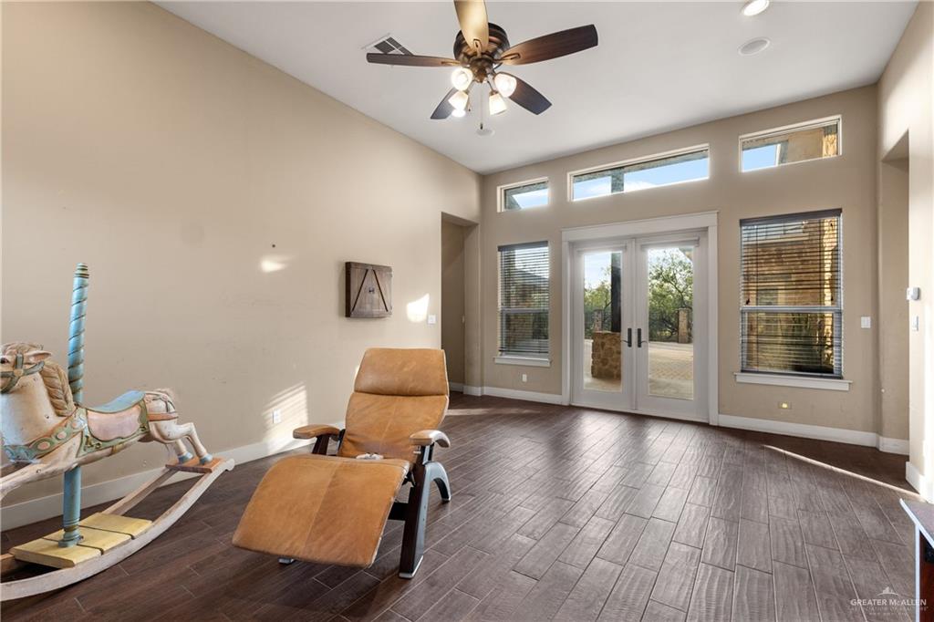 17839 Abd Road Harlingen, TX 78552 - Photo 13 of 38 a living room with furniture and a large window