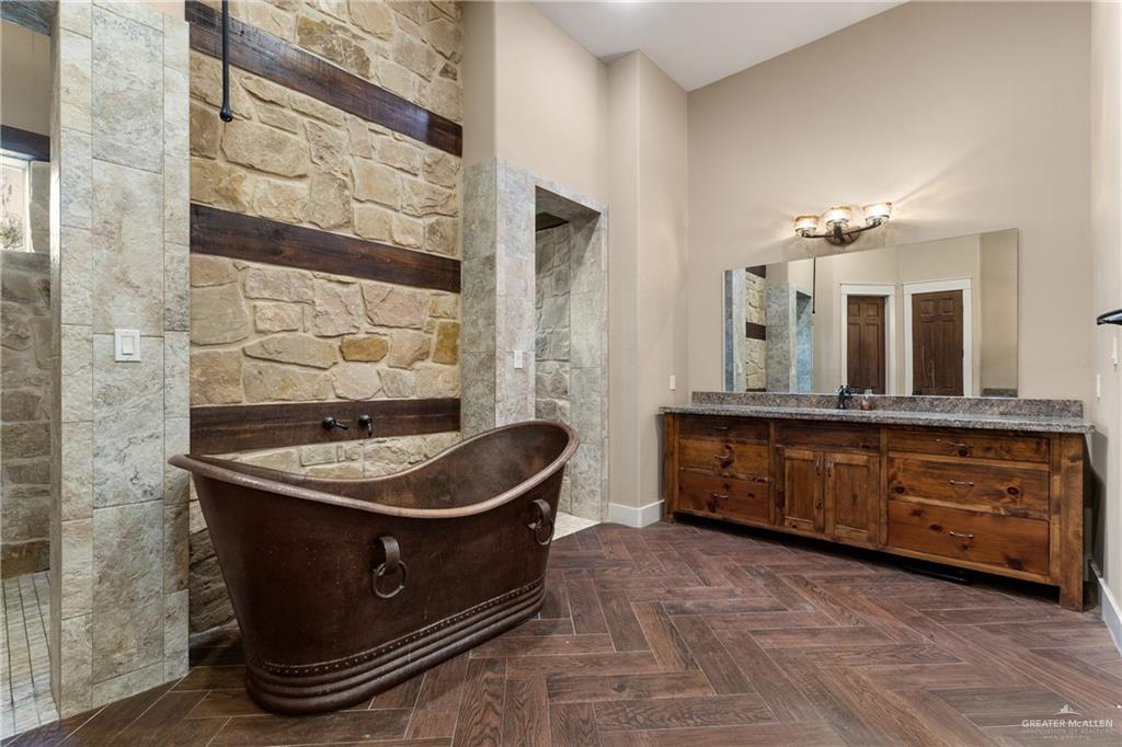 17839 Abd Road Harlingen, TX 78552 - Photo 16 of 38 a bathroom with a sink a mirror and a