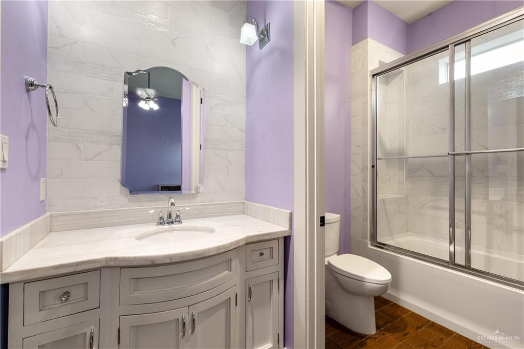 17839 Abd Road Harlingen, TX 78552 - Photo 20 of 38 a bathroom with a sink toilet and shower