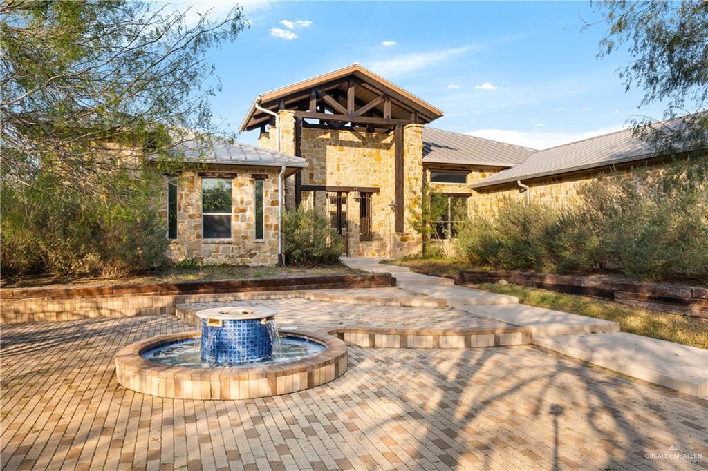 17839 Abd Road Harlingen, TX 78552 - Photo 2 of 38 a front view of a house with a yard