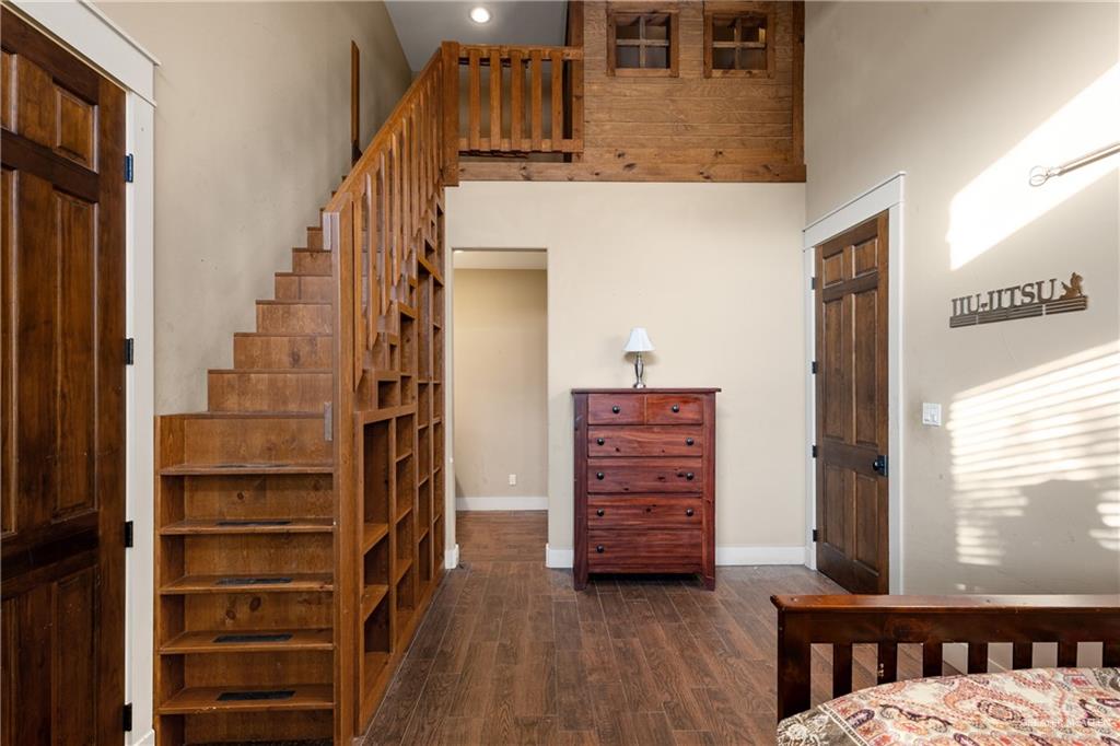 17839 Abd Road Harlingen, TX 78552 - Photo 22 of 38 a view of walk in closet with clothes and shoes