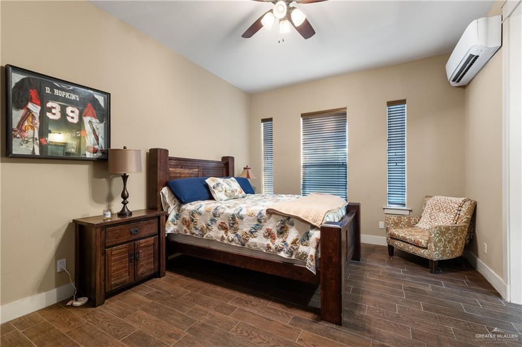17839 Abd Road Harlingen, TX 78552 - Photo 25 of 38 a bedroom with a bed and a couch