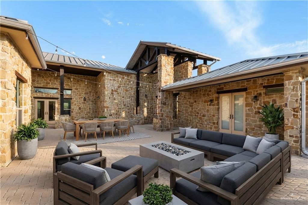 17839 Abd Road Harlingen, TX 78552 - Photo 27 of 38 a view of living room filled with furniture and a large window