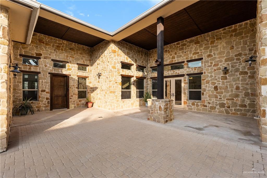 17839 Abd Road Harlingen, TX 78552 - Photo 28 of 38 a building with glass door