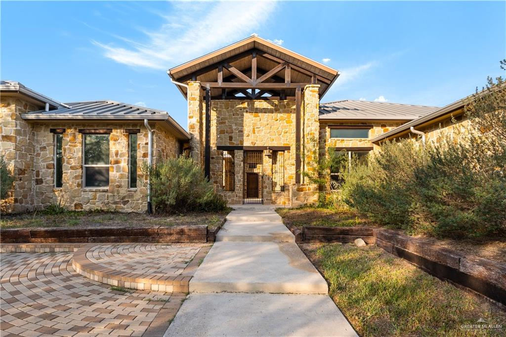 17839 Abd Road Harlingen, TX 78552 - Photo 3 of 38 a front view of a house with a yard