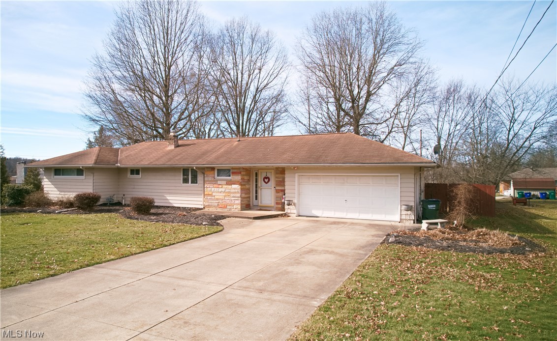 4061 Marks Rootstown, OH 44272 - Photo 1 of 25 Single story home with a front yard and a garage