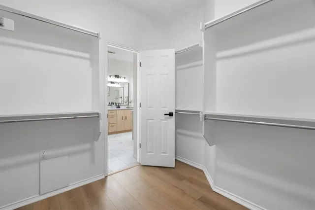 a view of an empty walk in closet