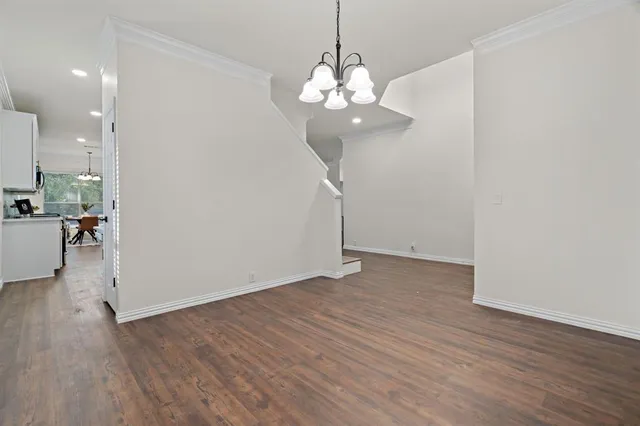 a view of a livingroom with wooden floor