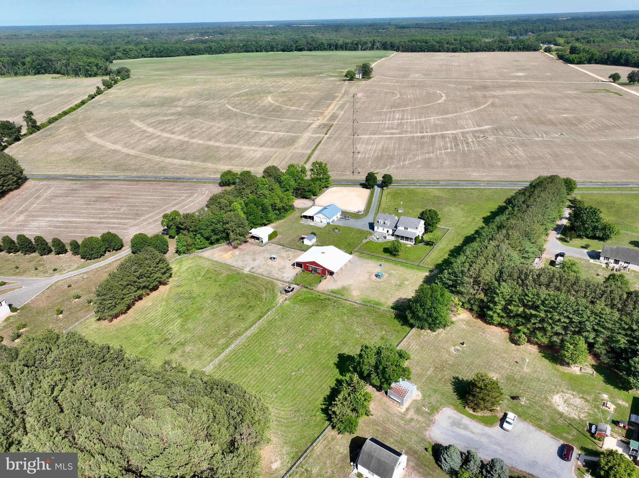 12136 Holly Road Ridgely, MD 21660 - Photo 126 of 136 an aerial view of ocean with residential house and outdoor space