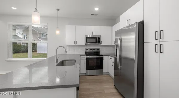 $1,945 | 8067 Purchase Place Northeast, Unit NEWPORT, Leland, NC 28451