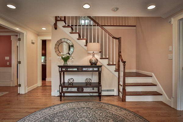 84 Sunset Rock Road Andover, MA 01810 - Photo 13 of 30 a view of entryway and hall with wooden floor