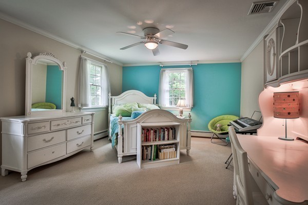 84 Sunset Rock Road Andover, MA 01810 - Photo 23 of 30 a room with furniture and a chandelier